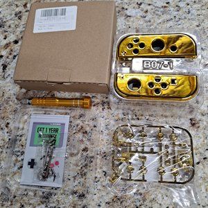 ExtremeRate Chrome Gold Nintendo Joycon Housing Shell New open box